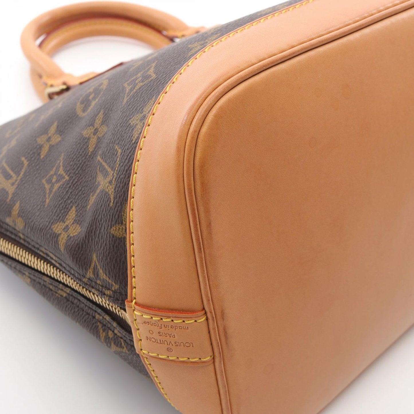 Louis Vuitton Alma PM Handbag - Timeless Elegance in Brown