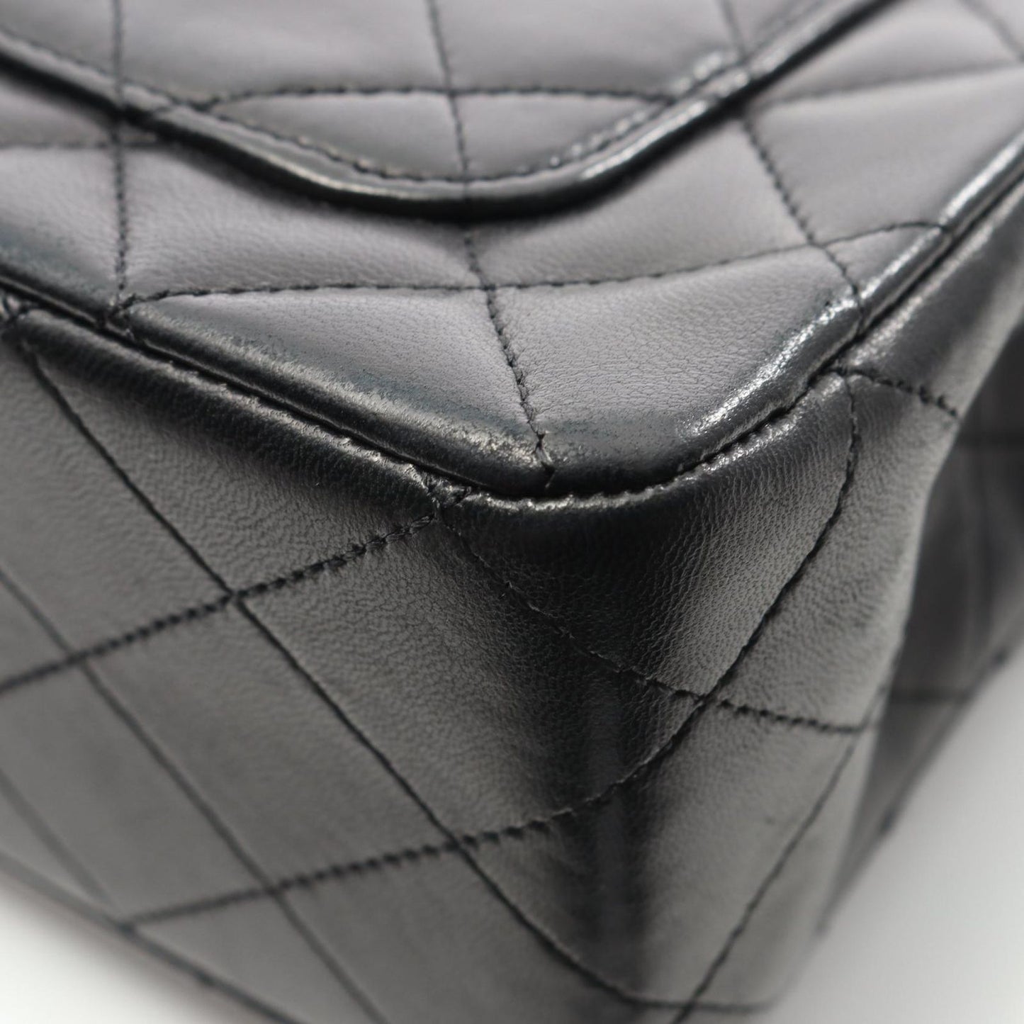 CHANEL Matelassé Double Flap Shoulder Bag in Black Lambskin