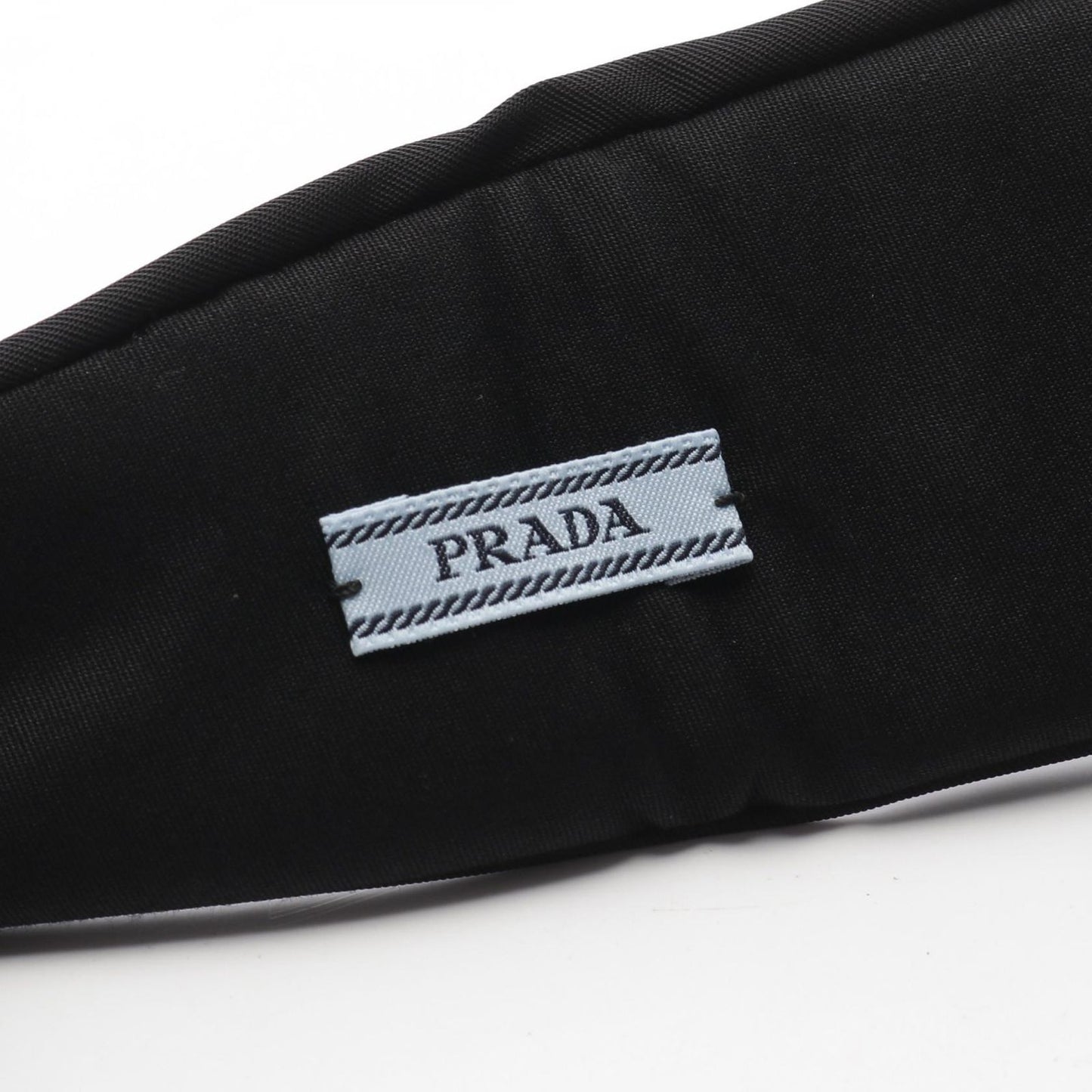 PRADA Triangle Logo Plate Hairband - Exquisite Black & Gold Design