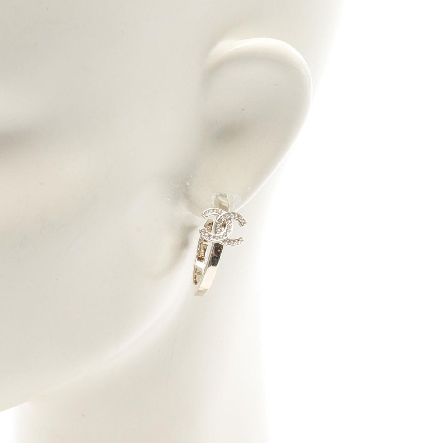 CHANEL Coco Mark Star Hoop Earrings in Gold Plated Luxury