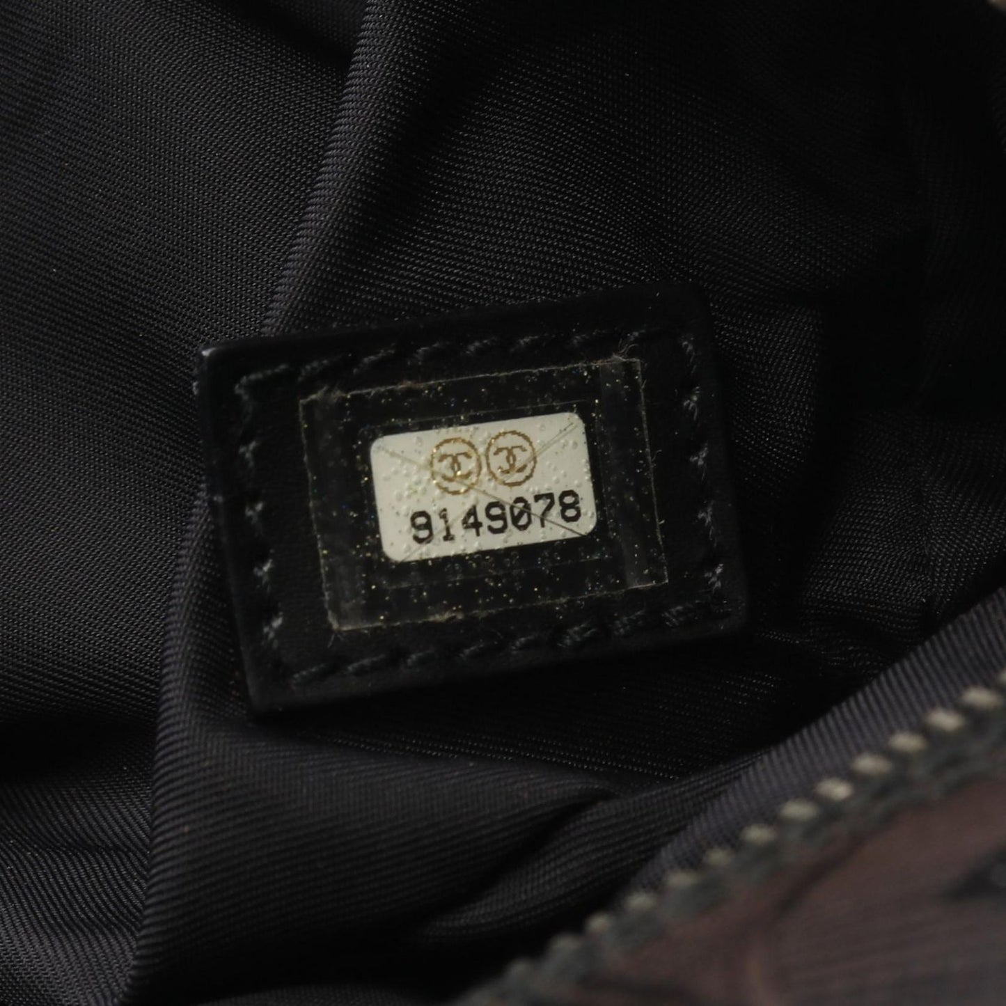 CHANEL Black Leather New Travel Line Handbag - Timeless Elegance