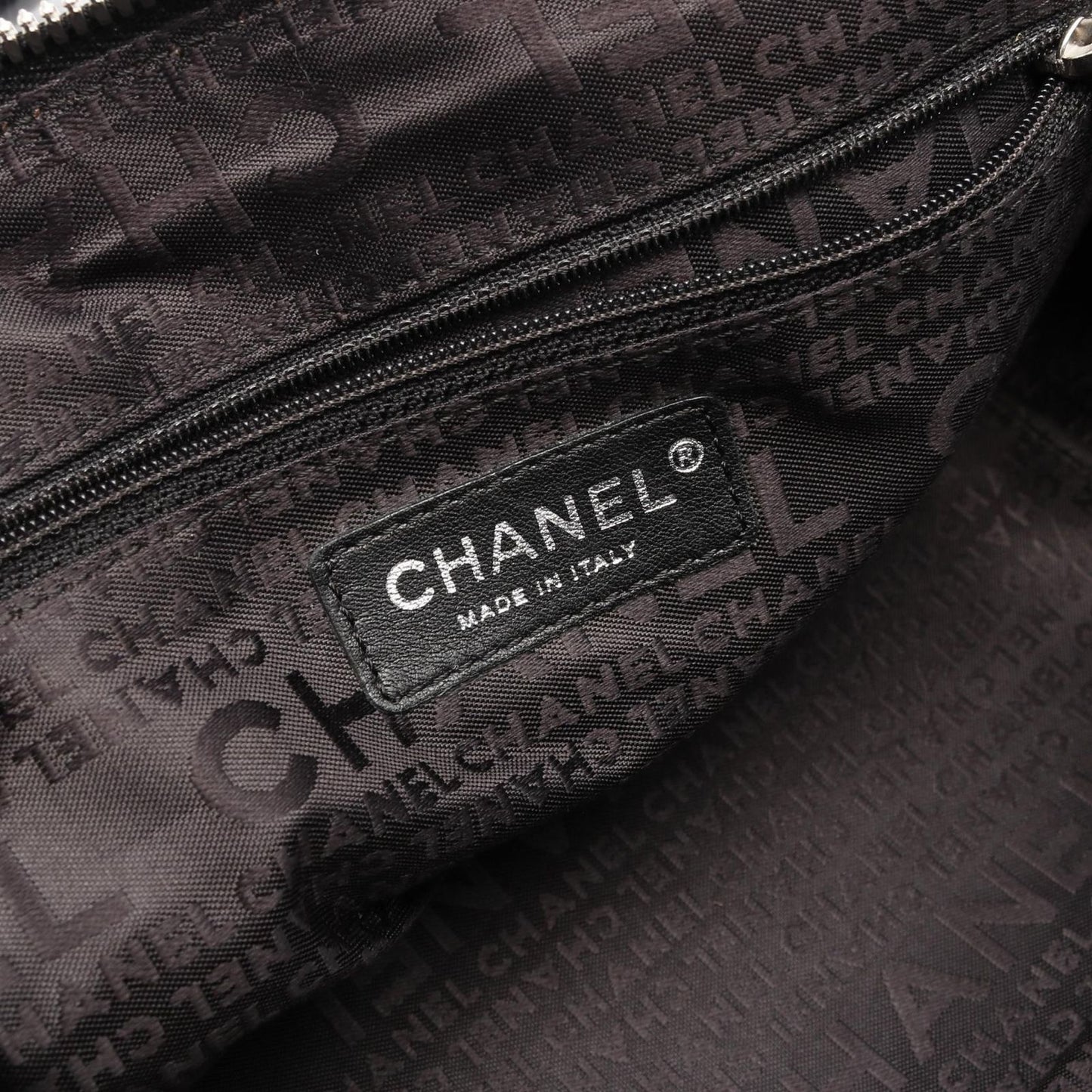 CHANEL Black Calfskin Logo Handbag with Fringe - Timeless Elegance