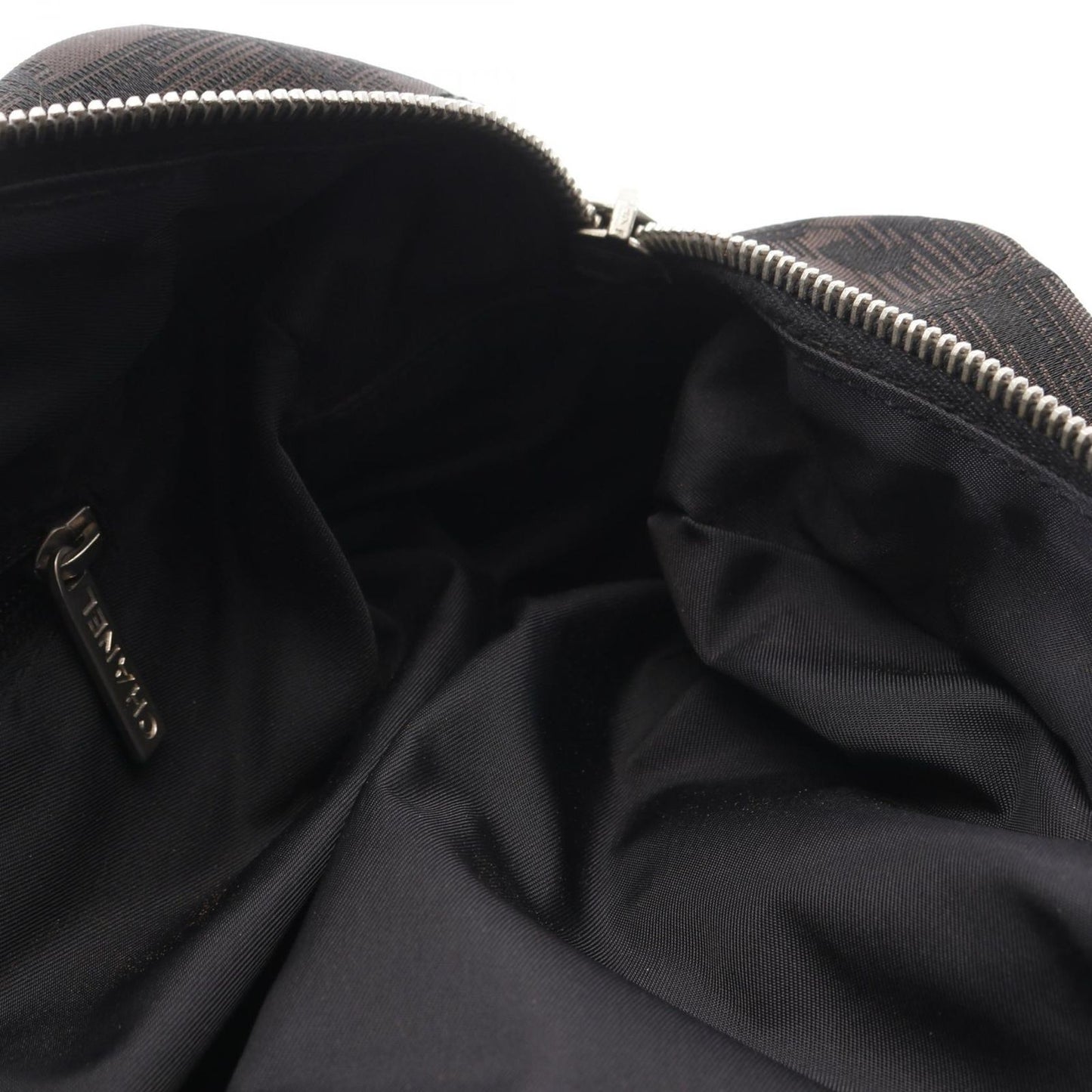 CHANEL Black Leather New Travel Line Handbag - Timeless Elegance