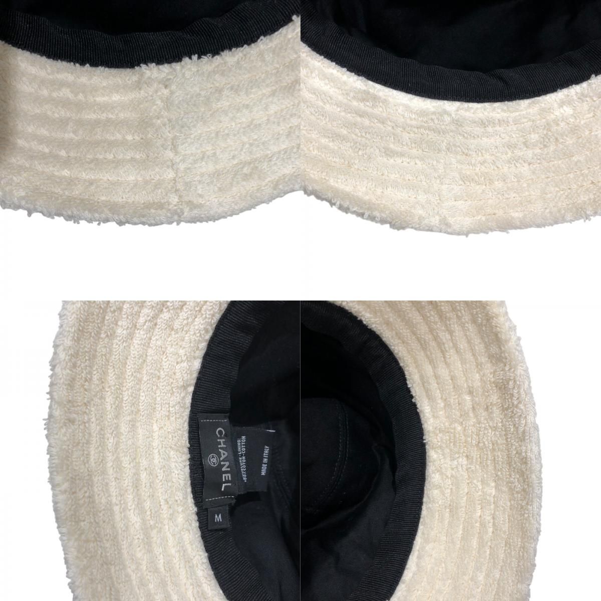 CHANEL Logo Embroidered Pile Bucket Hat in Cream Cotton