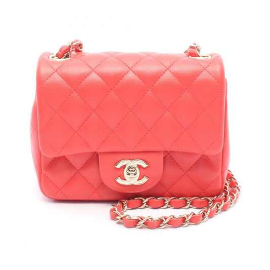 CHANEL Mini Matelassé Shoulder Bag in Coral Pink Leather