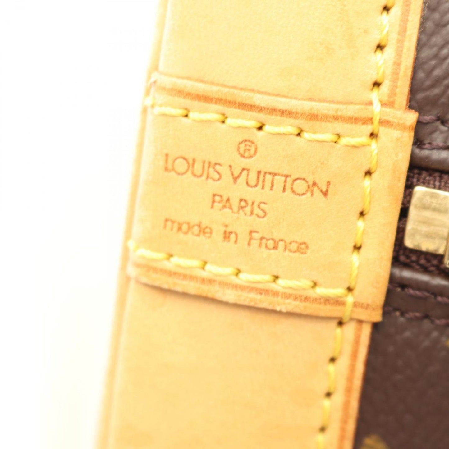 Louis Vuitton Alma PM Handbag - Timeless Elegance in Brown
