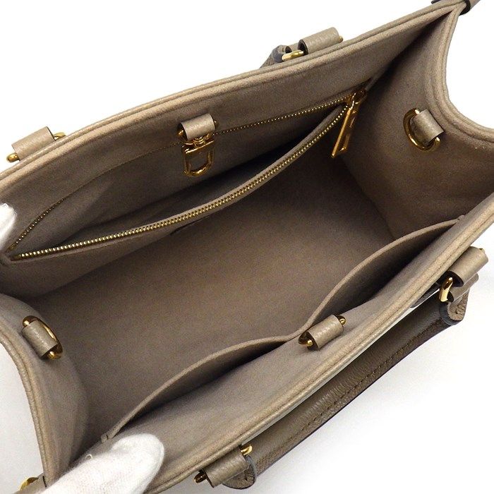 Louis Vuitton OnTheGo PM Handbag in Bi-Color Monogram - Exquisite Craftsmanship
