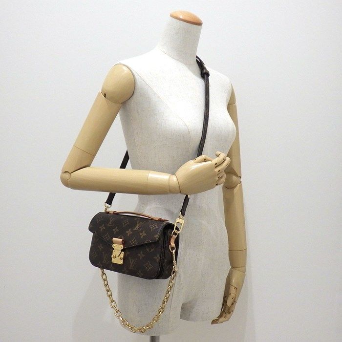 Louis Vuitton Monogram Pochette Métis EW Handbag - Timeless Elegance