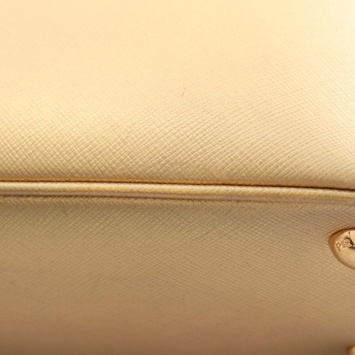 PRADA Saffiano Leather Handbag - Timeless Elegance in Gold