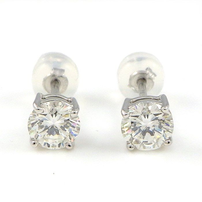 Exquisite Solitaire Diamond Earrings in Platinum - 0.526ct & 0.521ct