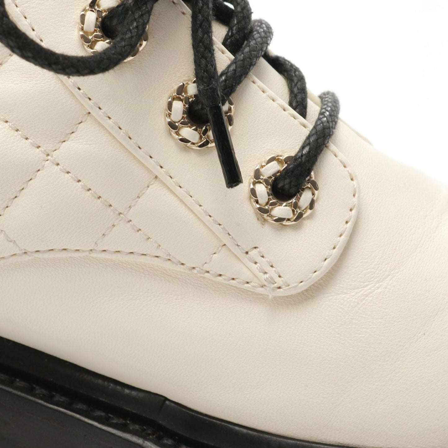 CHANEL Matelassé Leather Short Boots in White & Black - Size 36.5C