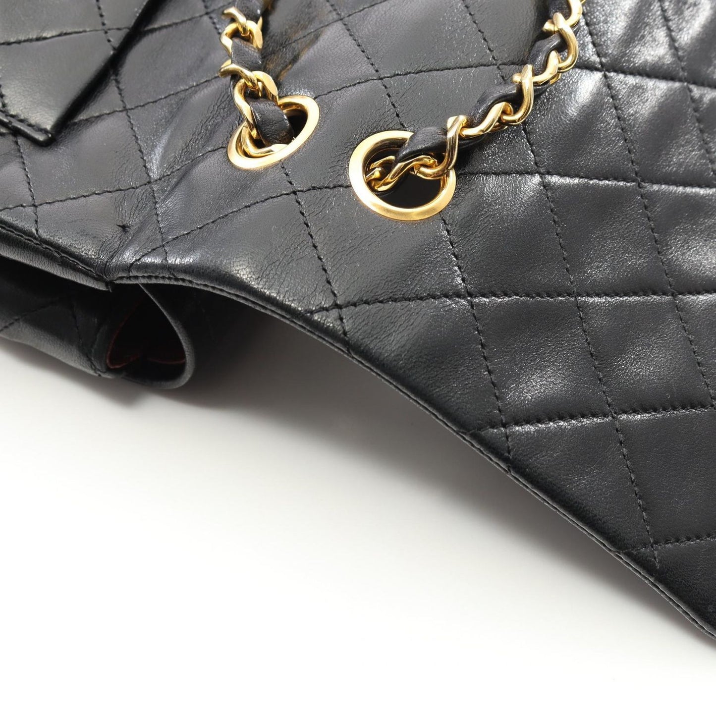 CHANEL Matelassé Double Flap Shoulder Bag in Black Lambskin