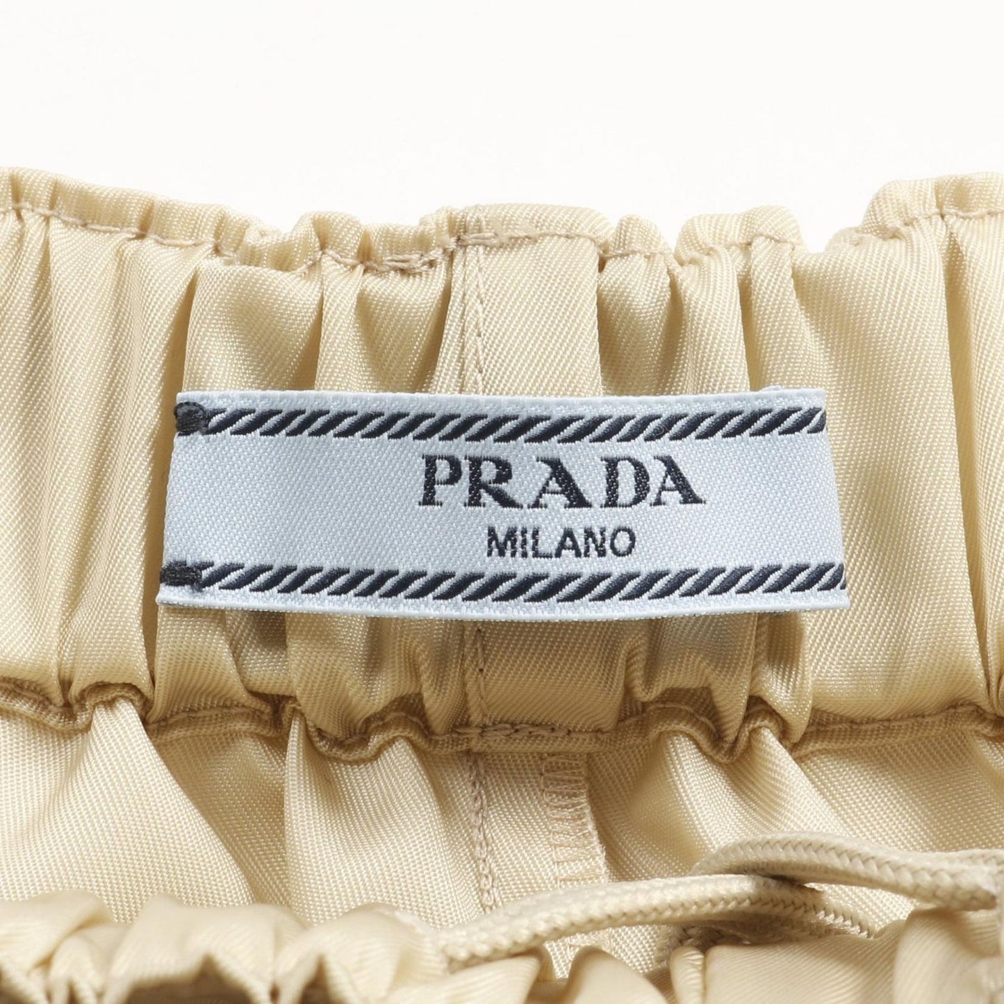 PRADA RE-NYLON Beige Shorts - Unworn Luxury Fashion Statement