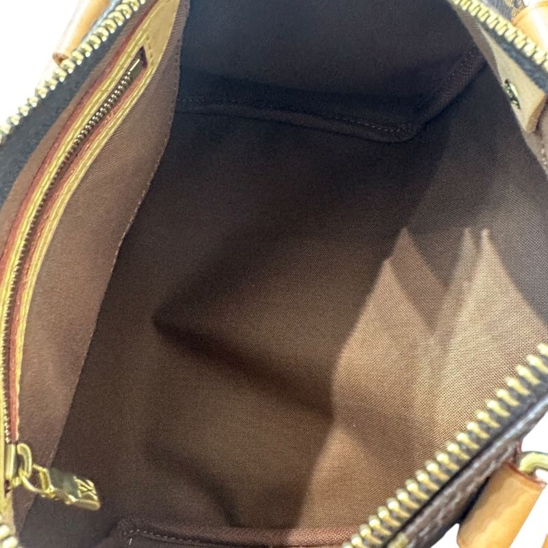 Louis Vuitton Speedy 25 Monogram Handbag - Timeless Elegance