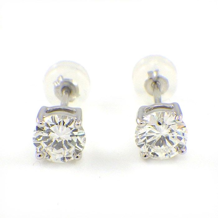 Exquisite Diamond Solitaire Earrings in Platinum - 0.526ct & 0.510ct