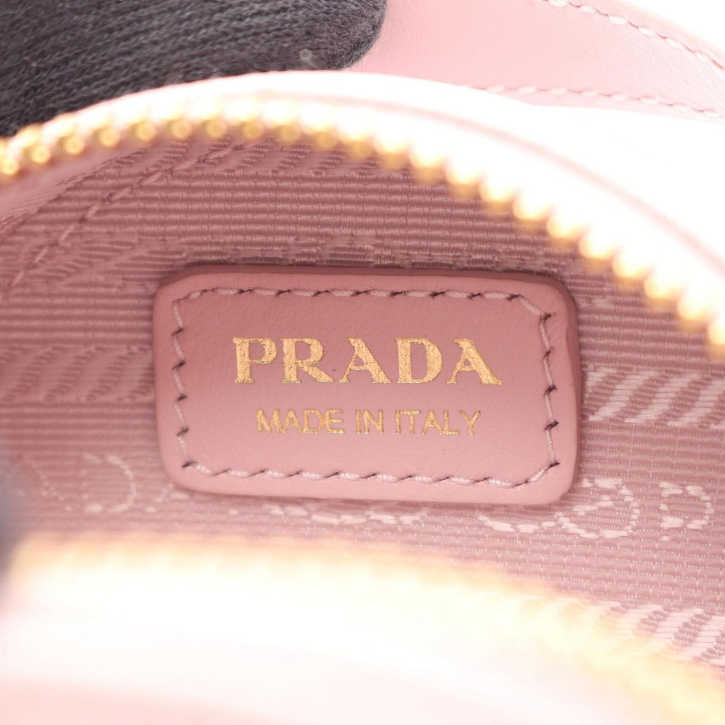 PRADA Saffiano Triangle Mini Pouch in Baby Pink - Unused Luxury