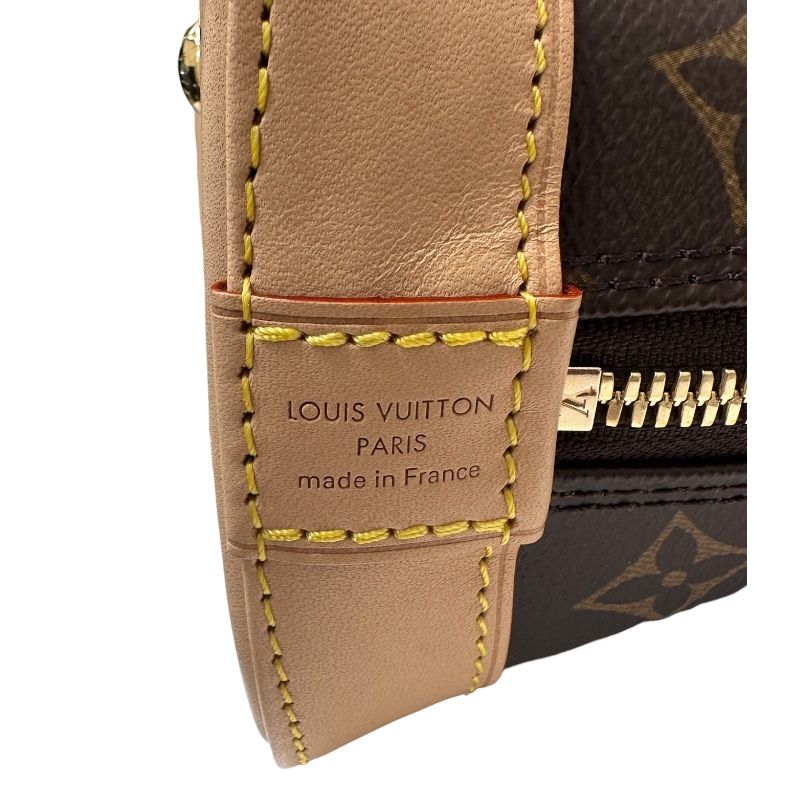 Louis Vuitton Alma BB Monogram PVC Leather Handbag - Timeless Elegance