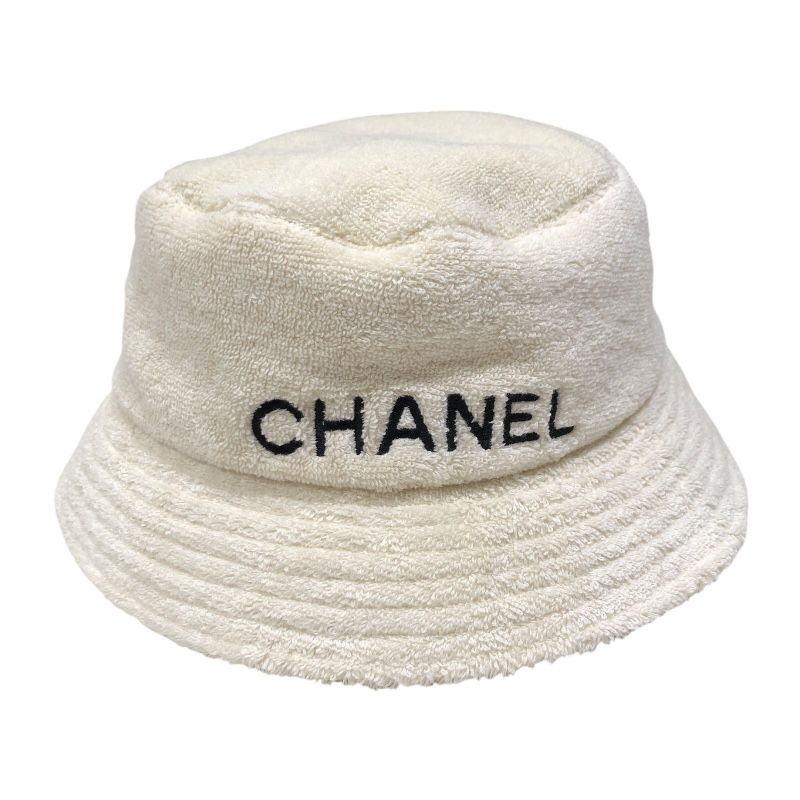 CHANEL Logo Embroidered Pile Bucket Hat in Cream Cotton
