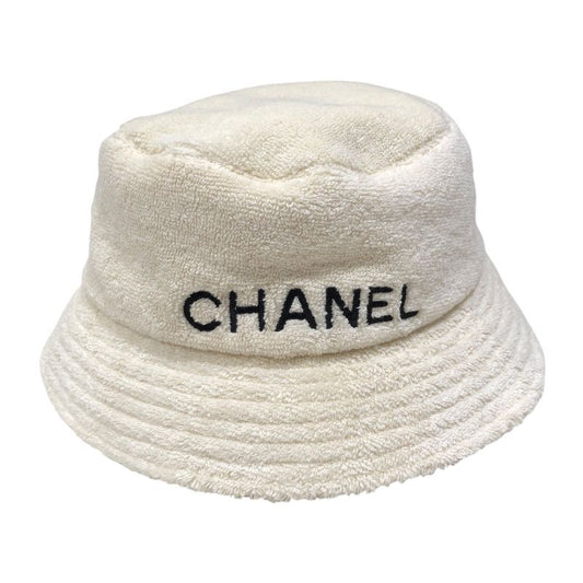 CHANEL Logo Embroidered Pile Bucket Hat in Cream Cotton