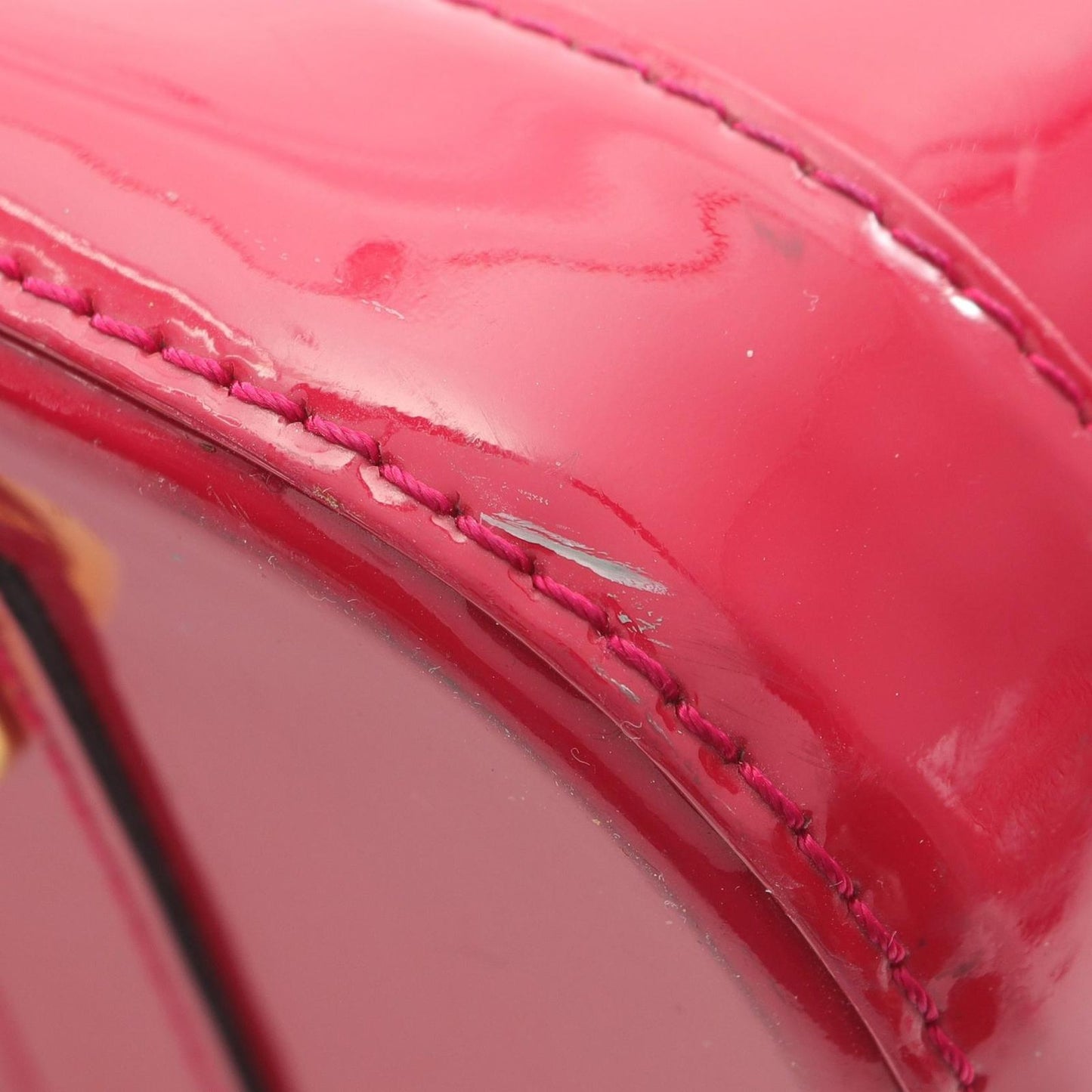 Louis Vuitton Alma PM Monogram Vernis Handbag in Magenta