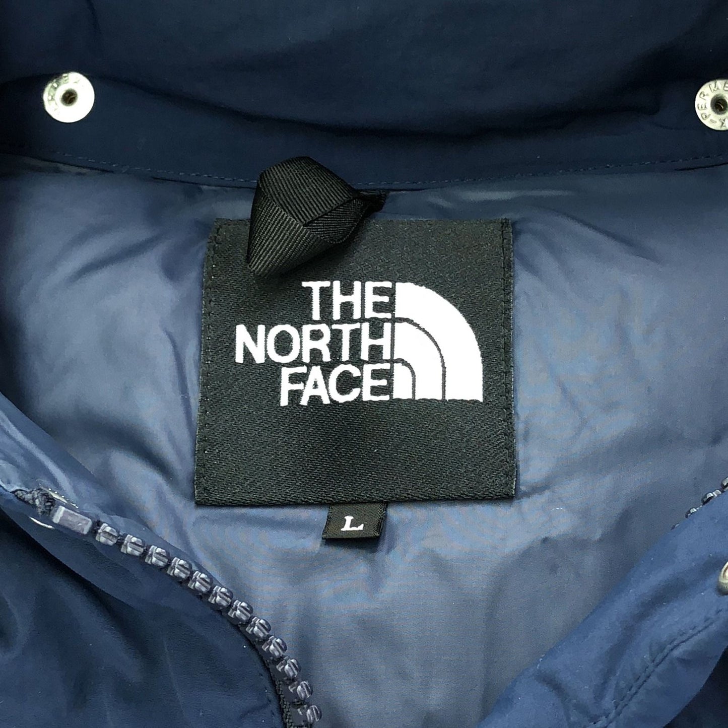 THE NORTH FACE Navy Down Jacket - Timeless Outdoor Elegance