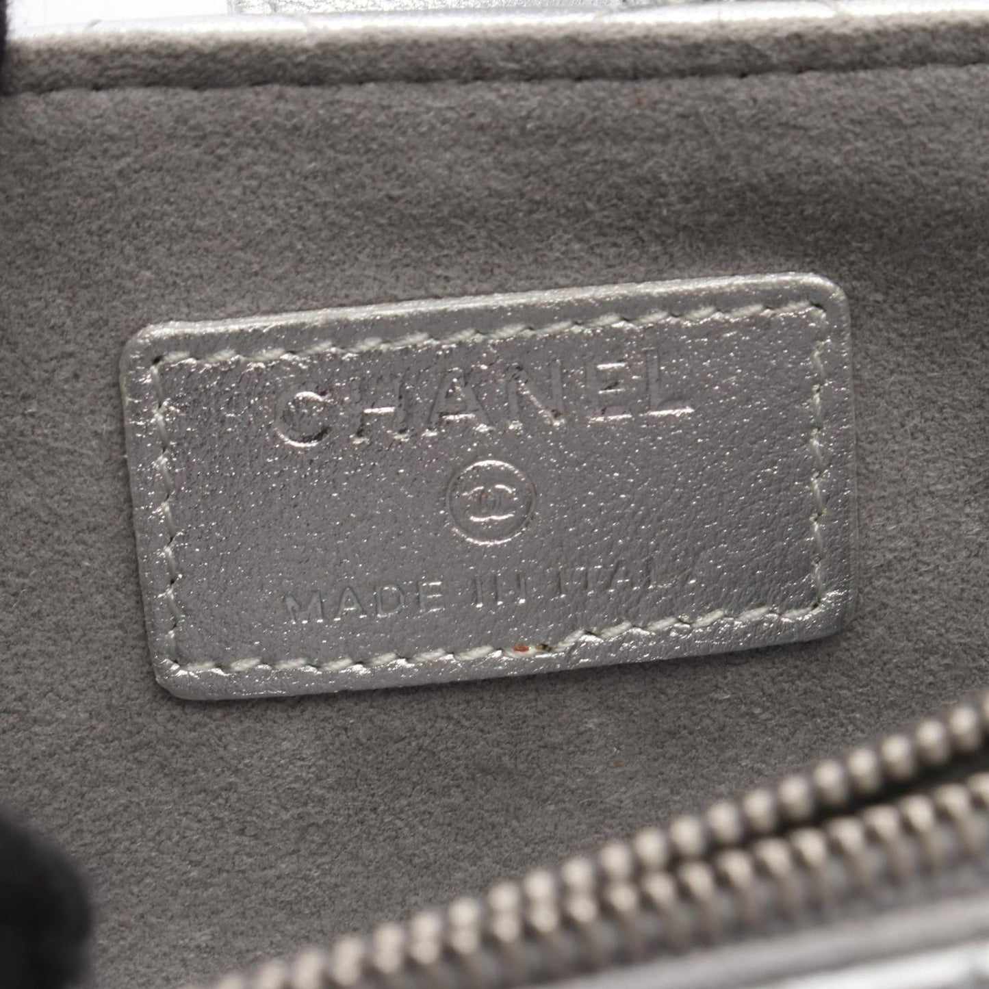 CHANEL Matelassé Silver Leather Pouch - Exquisite Craftsmanship