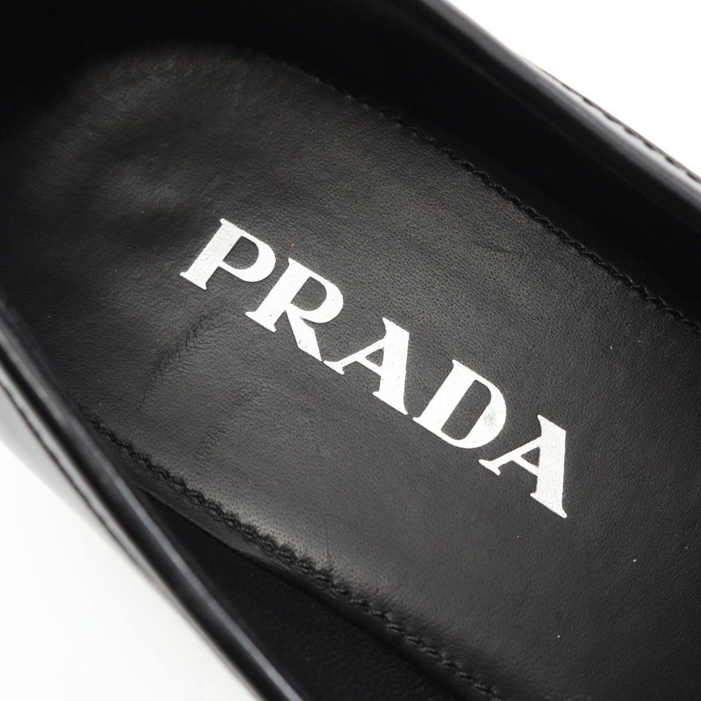 PRADA Triangle Logo Leather Loafers - Timeless Elegance