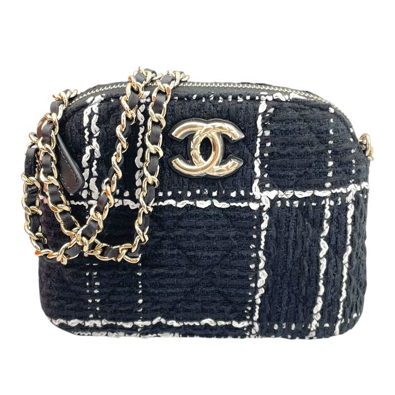 CHANEL Chain Shoulder Bag in Black/White Tweed - Timeless Elegance