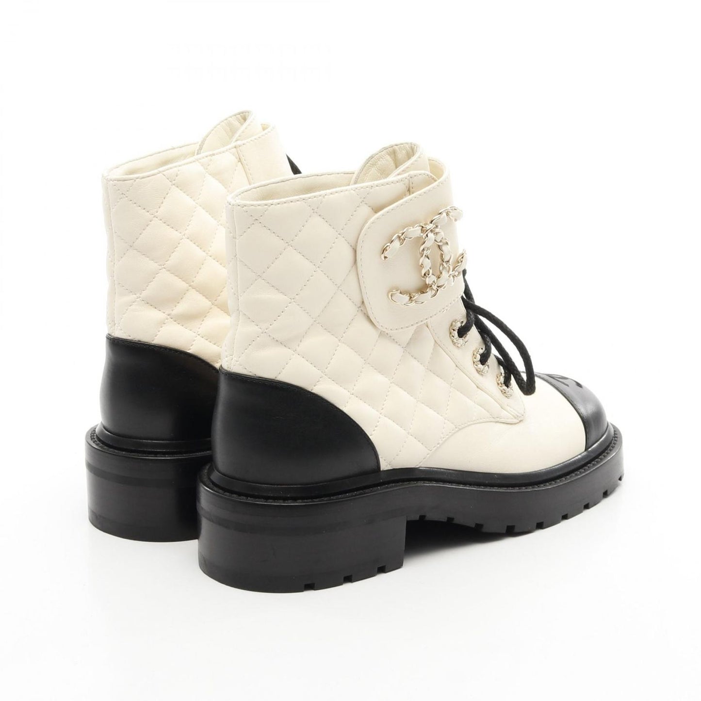 CHANEL Matelassé Leather Short Boots in White & Black - Size 36.5C