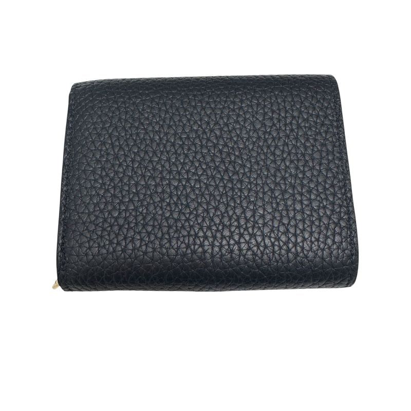 Louis Vuitton Capucines Tiny Wallet in Black Trianon Leather