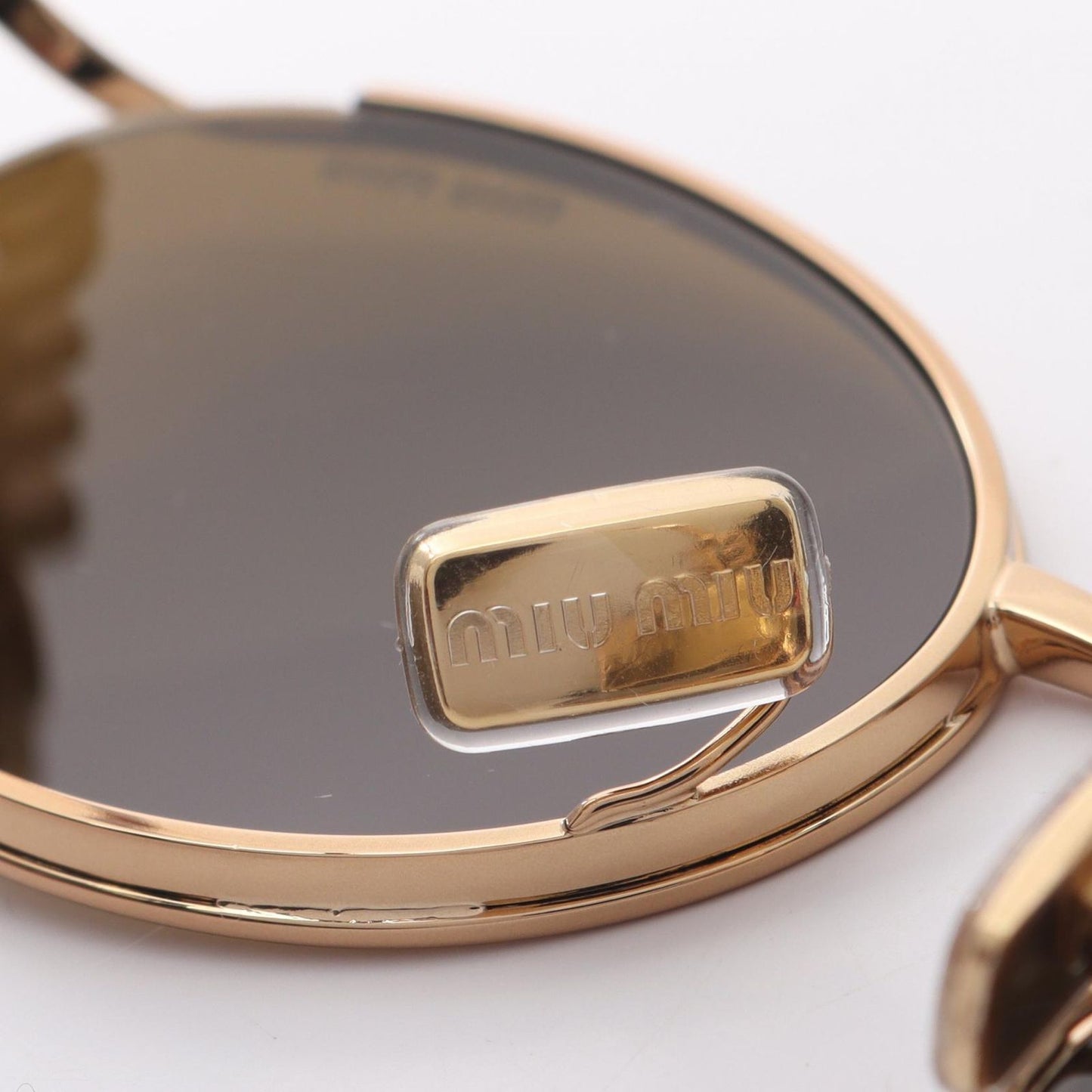 Miu Miu Brown & Gold Sunglasses - Timeless Elegance