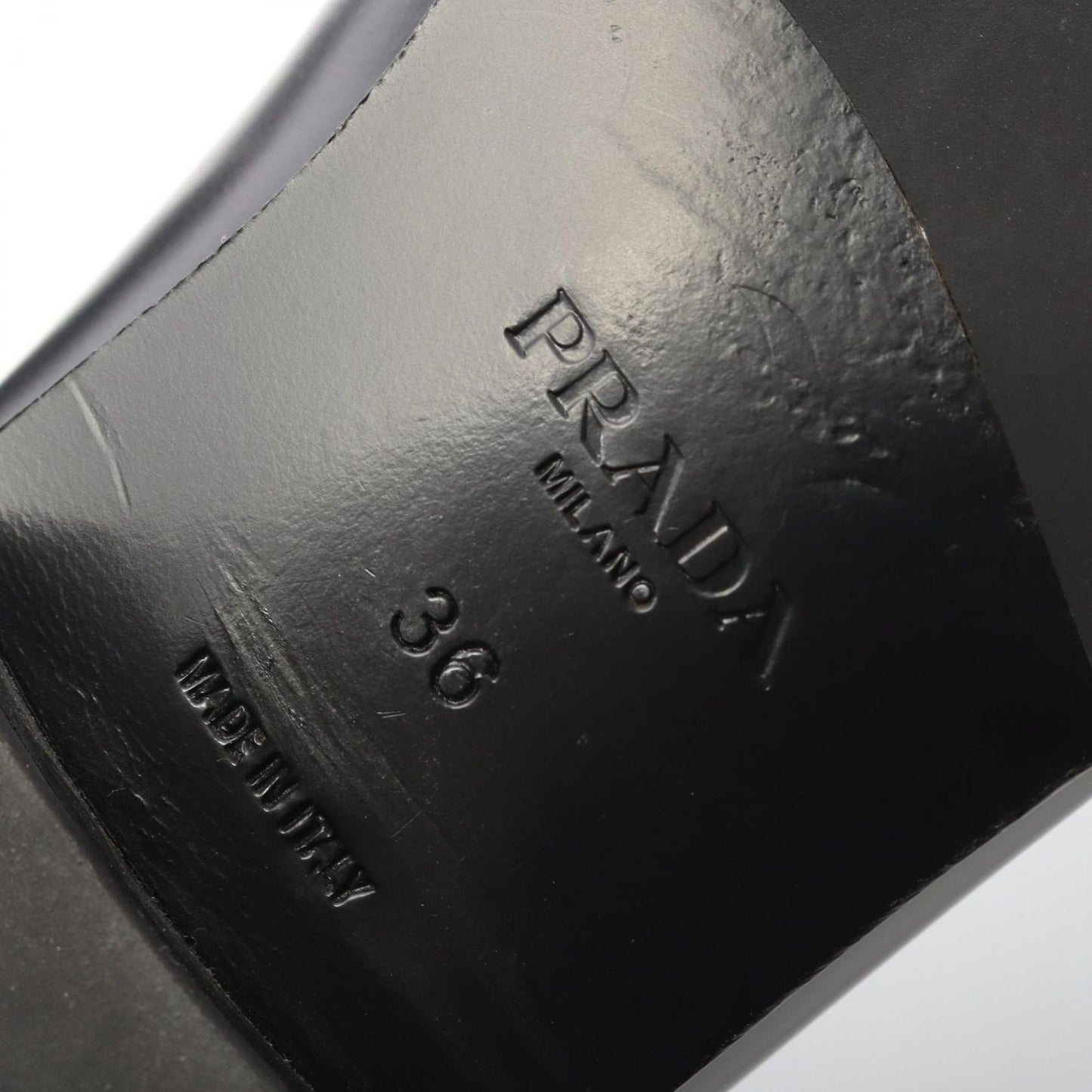 PRADA Triangle Logo Leather Loafers - Timeless Elegance