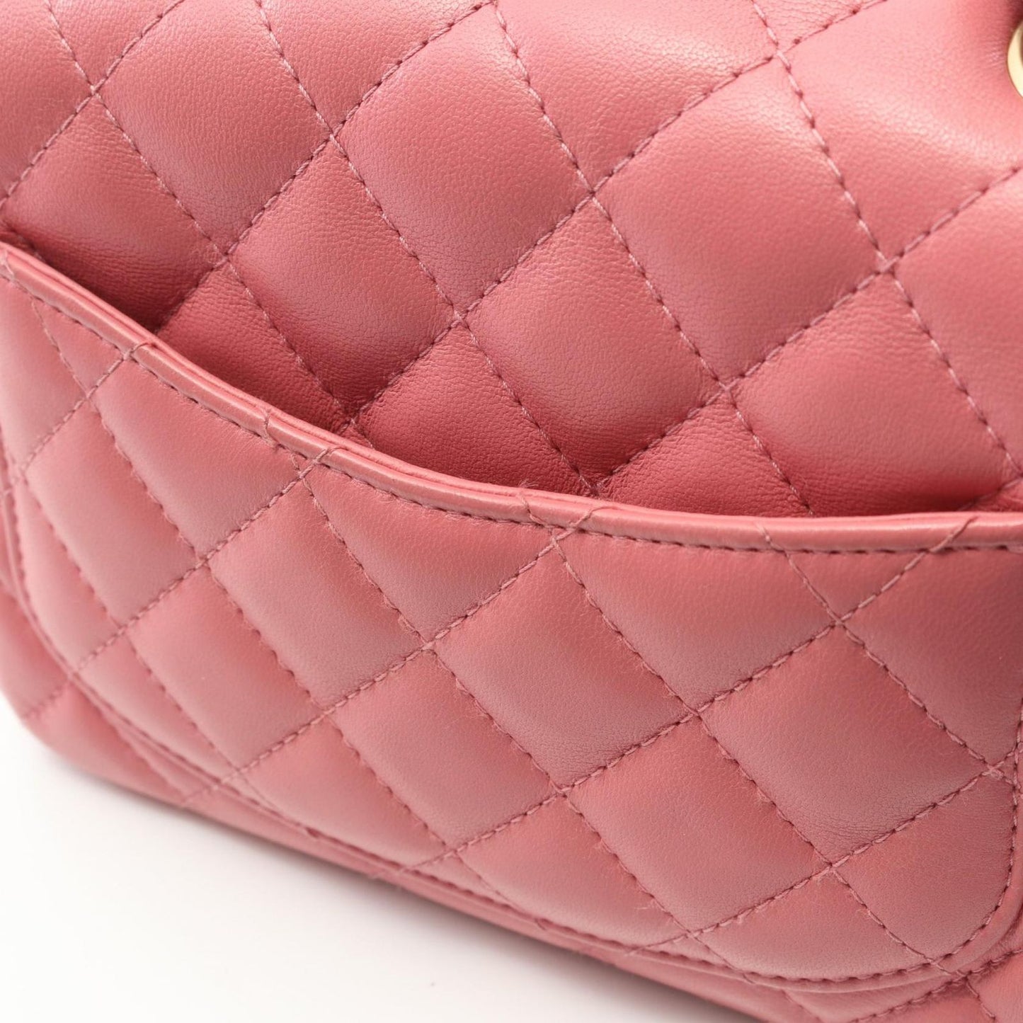 CHANEL Mini Matelassé Shoulder Bag in Pink Lambskin - A35200