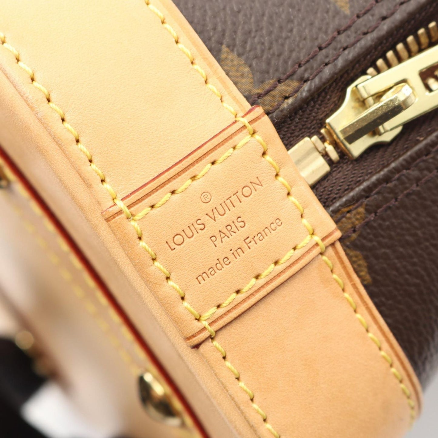 Louis Vuitton Alma BB Monogram Handbag - Timeless Elegance