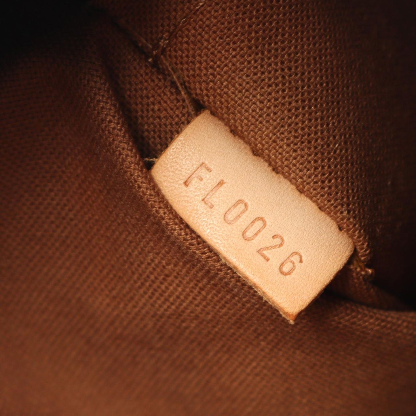 Louis Vuitton Lockit PM Handbag - Timeless Elegance in Brown