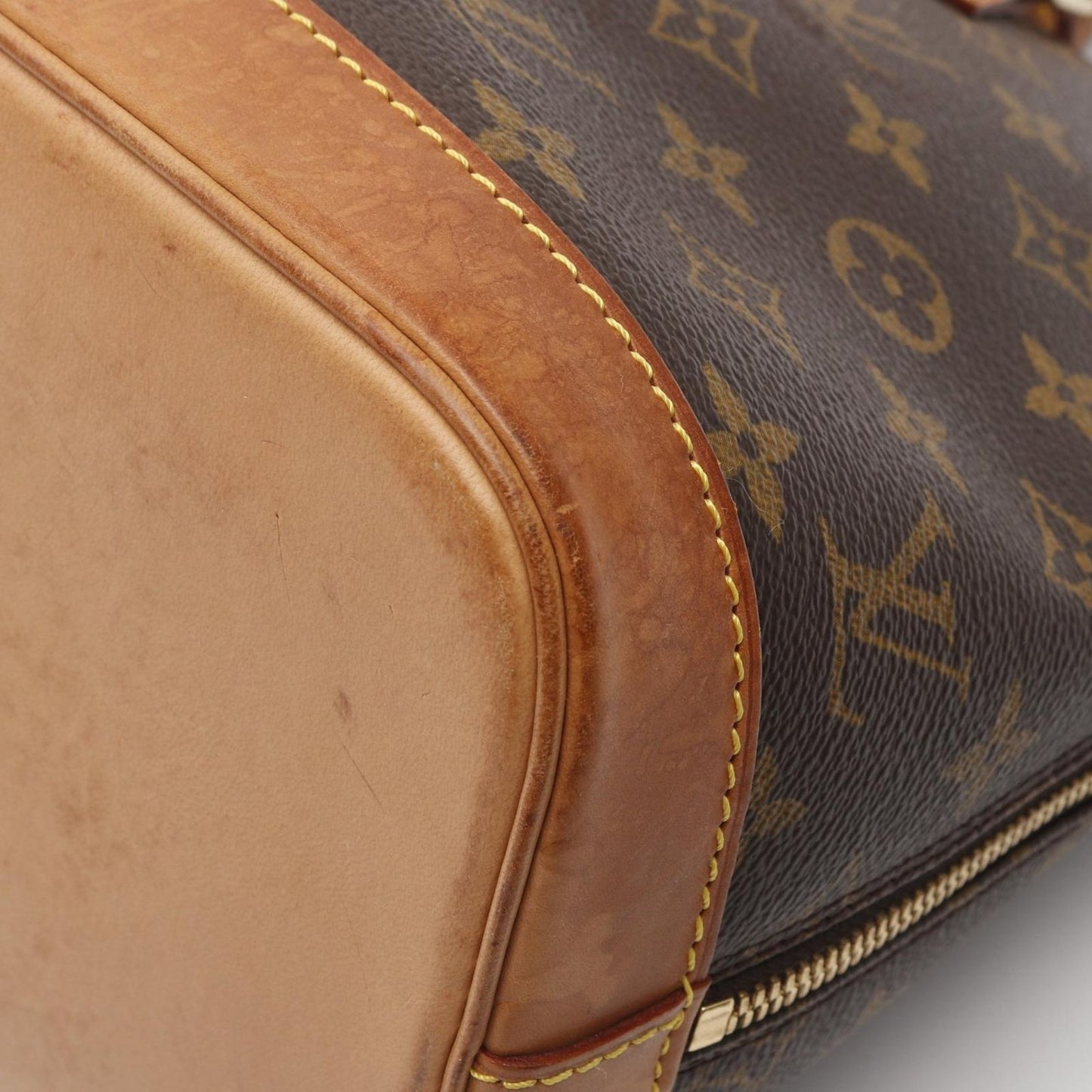 Louis Vuitton Alma PM Monogram Handbag - Timeless Elegance